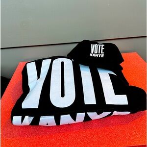 Yeezy VOTE KANYE campaign hoodie and snap back hat.